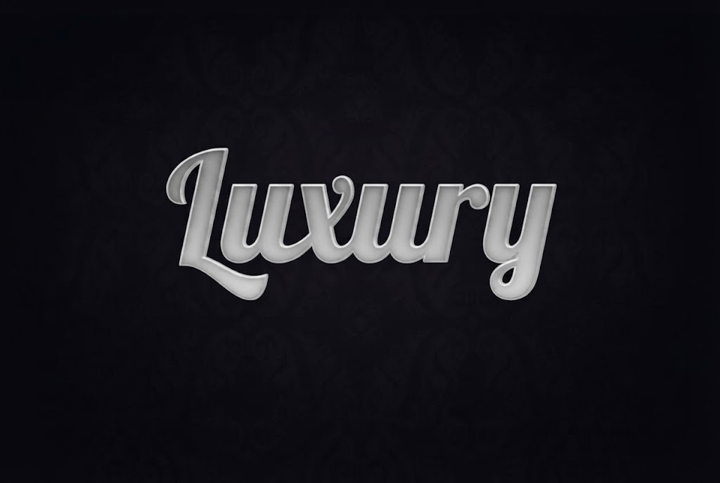 Silver glossy script text effect on dark damask